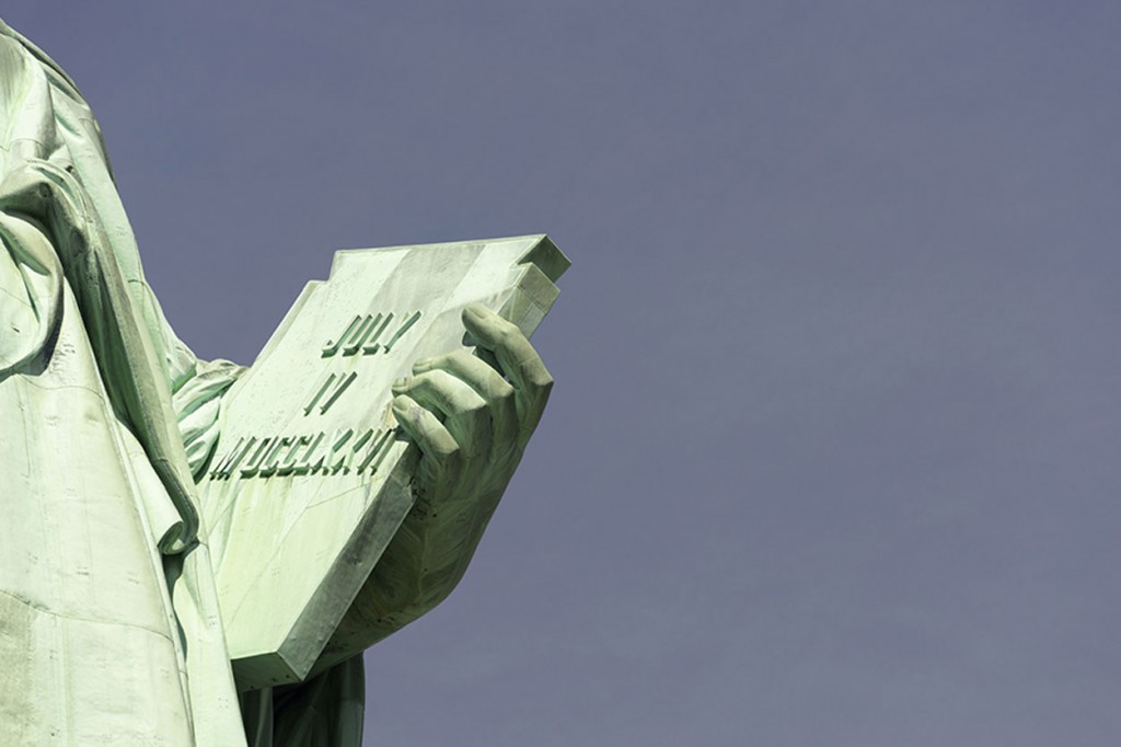 Statue holding Independence day document