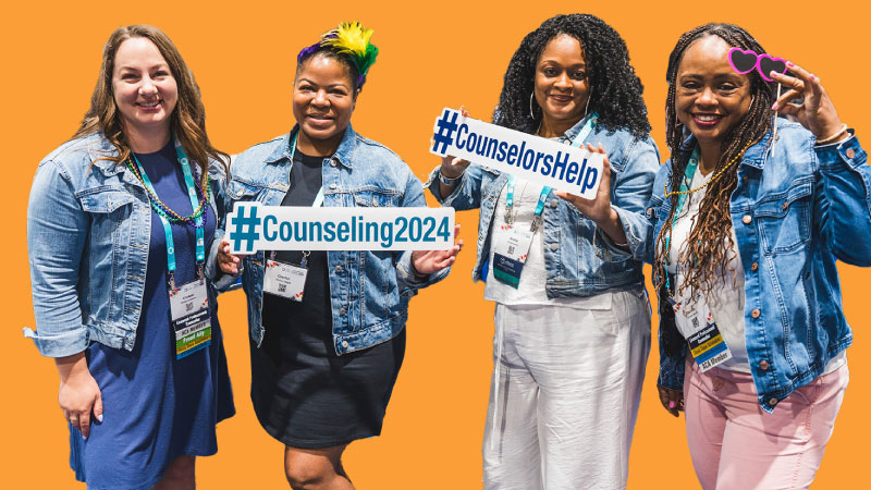 Members holding Counseling 2024 signs