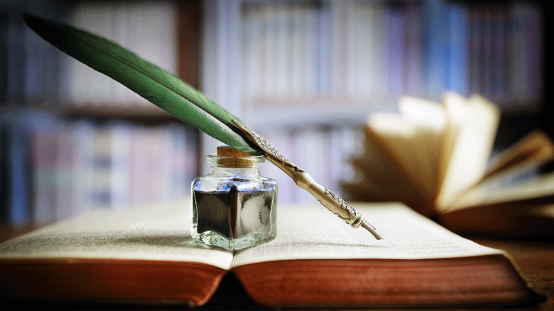 Pen resting on a book